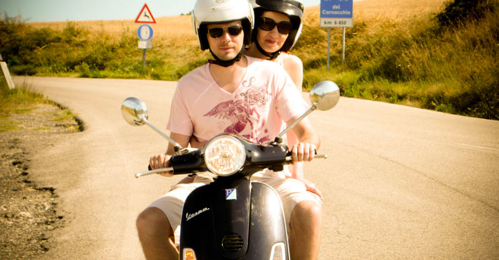 Sunny ride crossing hills between San Gimignano and Volterra (Vespa Tour)