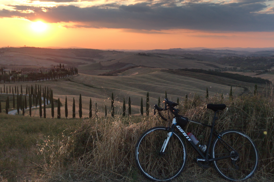 Flavia from Bucharest waiting sunset riding Siena hills